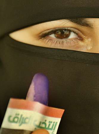 Woman with tears in her eyes after casting her vote.